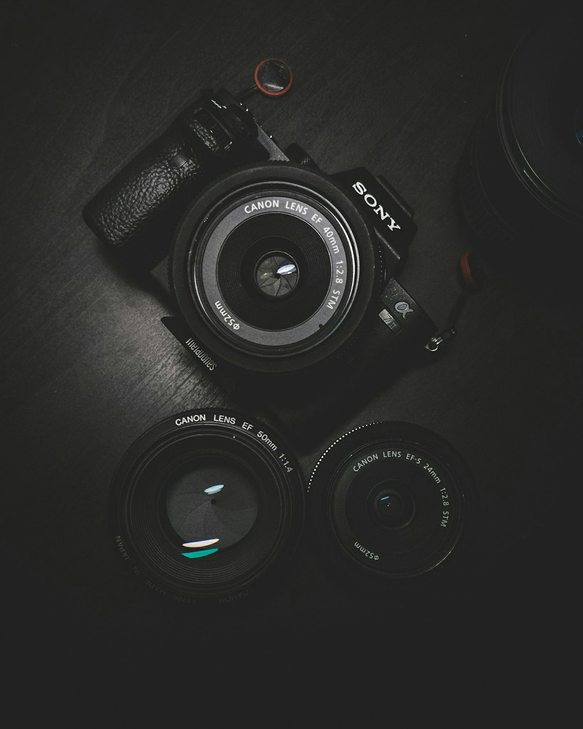 Illustrative stock photograph of a camera and lenses